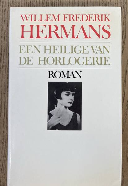 HERMANS, WILLEM FREDERIK. Een heilige van de horlogerie. Linnen met stofomslag.001